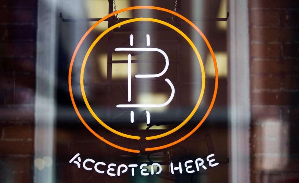 A retail storefront in Toronto, Canada offering to accept Bitcoin -- reflecting the growing accessibility of cryptocurrency beyond online platforms.